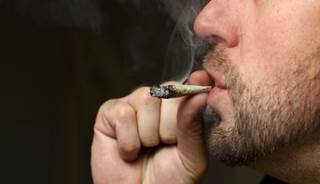 Man smoking marijuana Man smoking marijuana